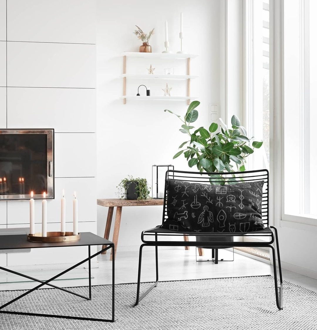 Nordic style interior with white and black furniture and wooden stars