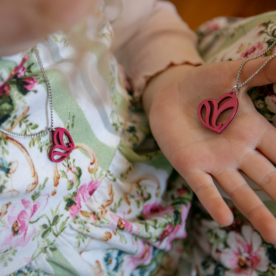 Me and mini me -heart pendants Childs hand