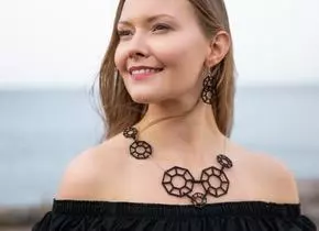 Woman wearing wooden statement jewellery